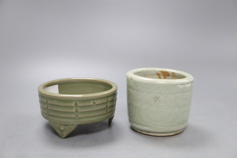 A Chinese celadon glazed tripod brushwasher and another, tallest 8cm